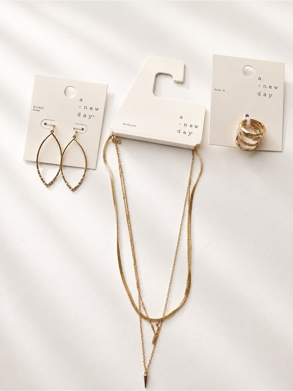 a new day Gold Layered Pendant Necklace with Pointed Charm